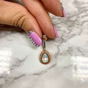 Gold “cat eye” crystal belly ring